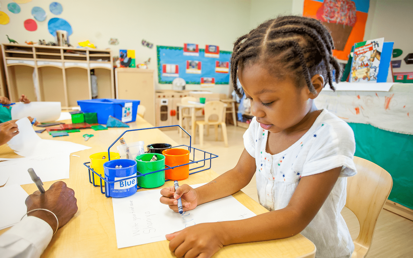 Little girl painting