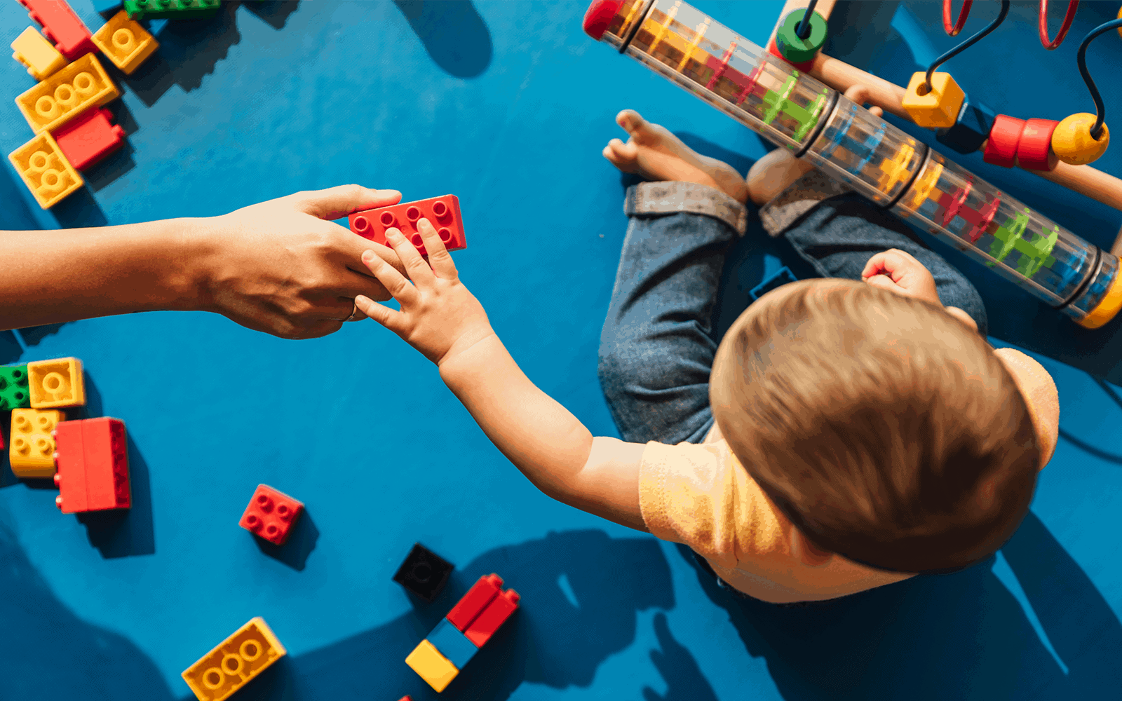 Baby playing with legos