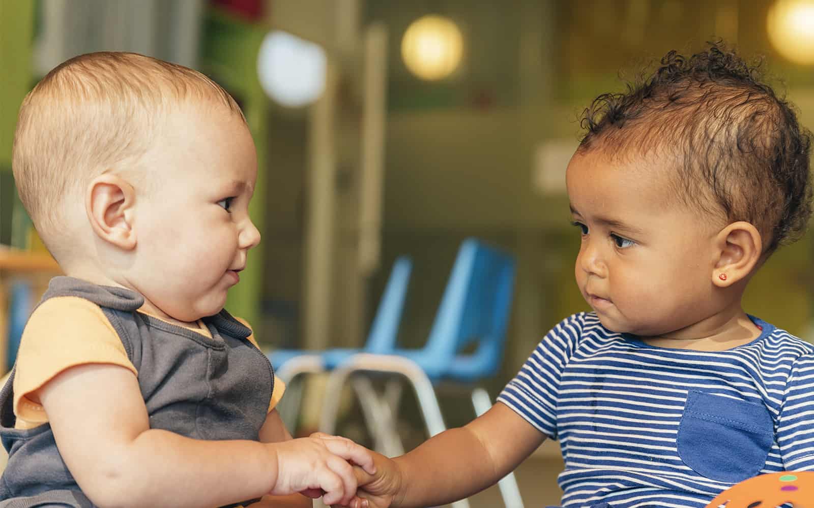 Two babies playing together