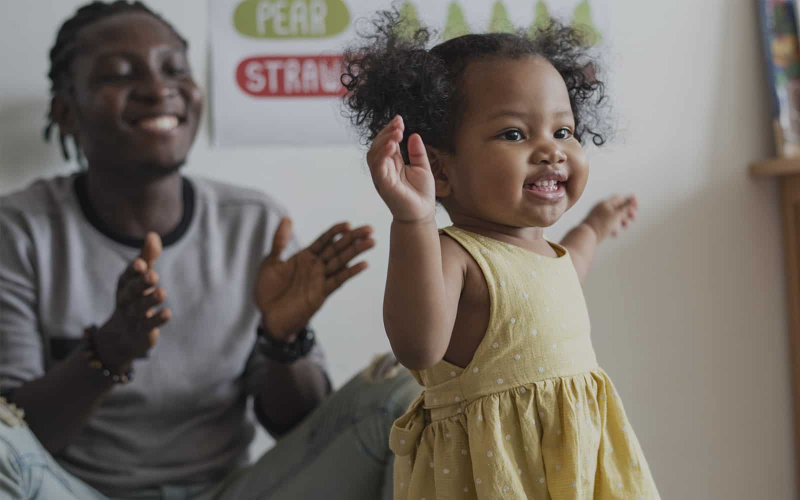 Father and daughter playing at home