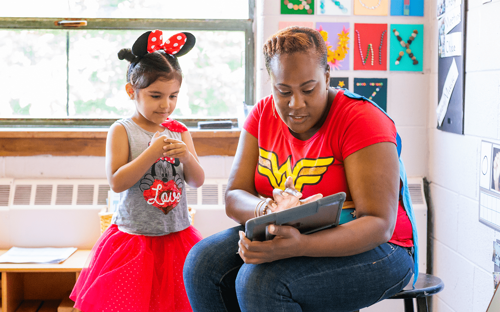 Little girl with teacher