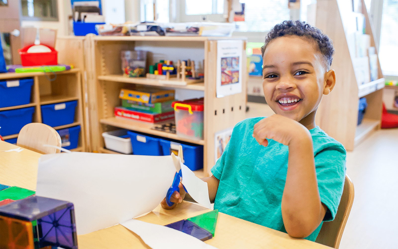 Boy smiling in classroom