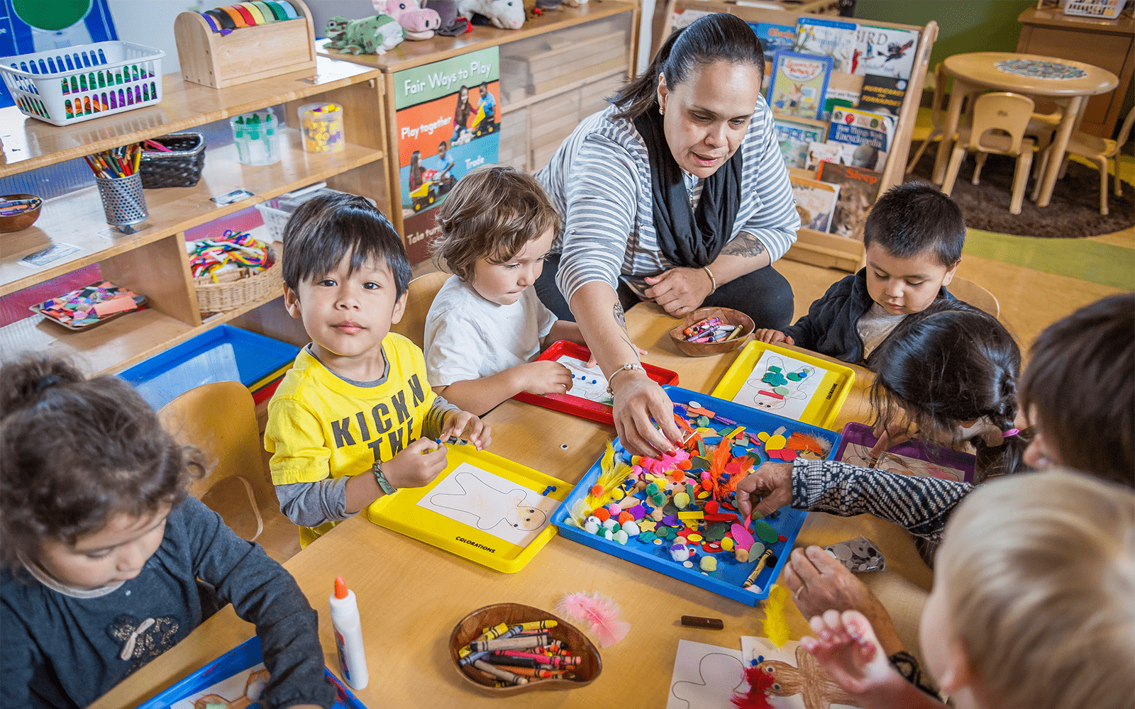 Classroom with many kids at table
