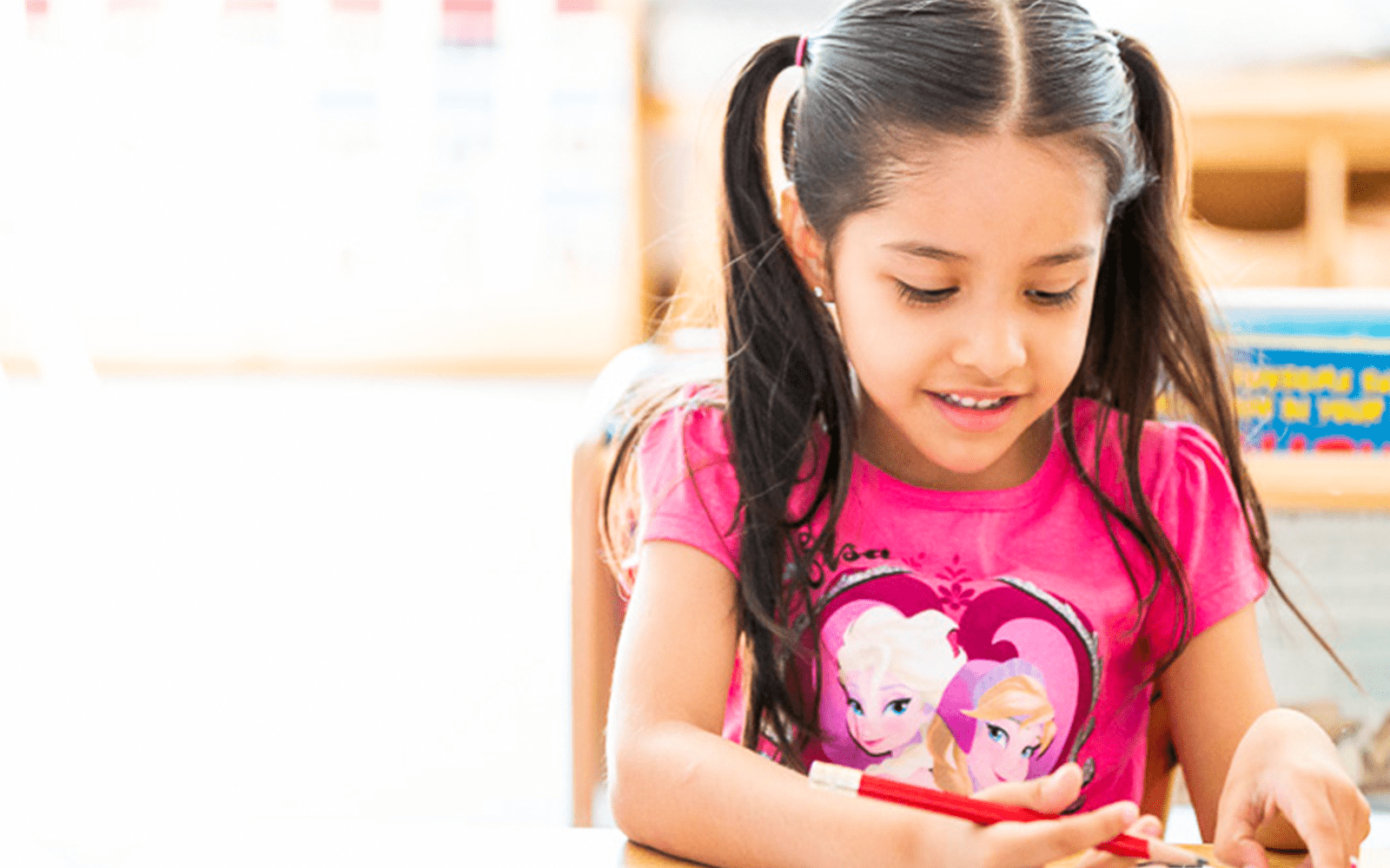 Little girl writing