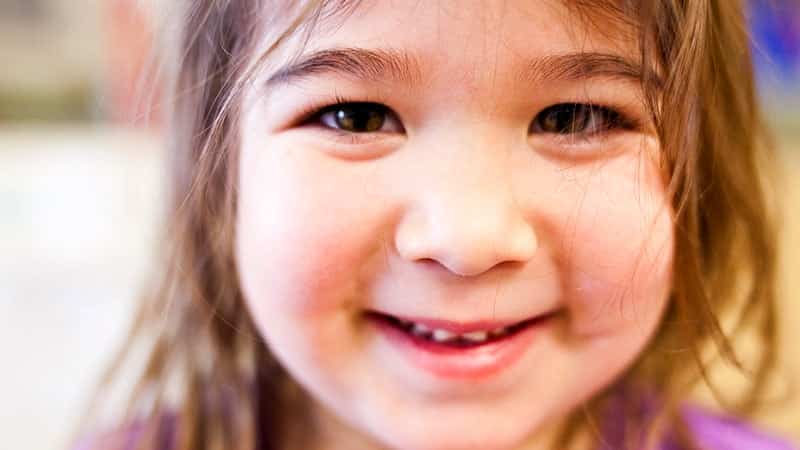 Child smiling close up