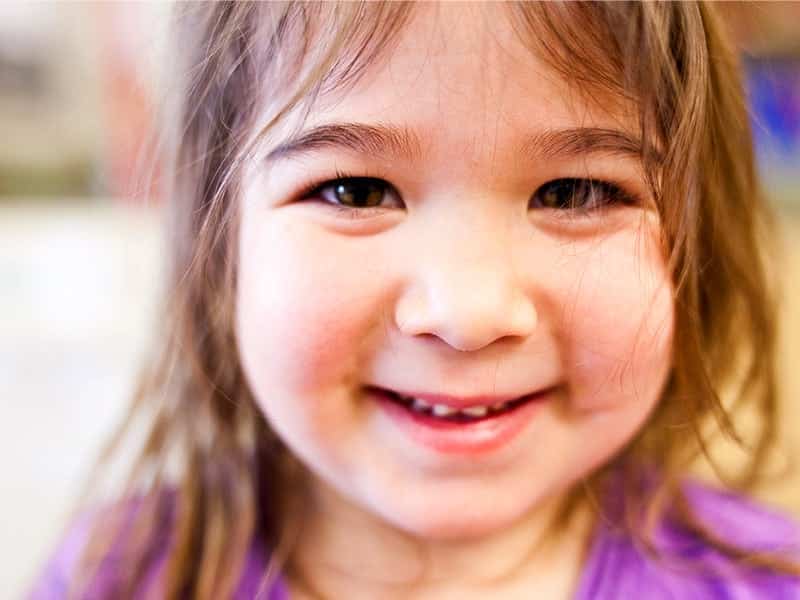 Child smiling close up