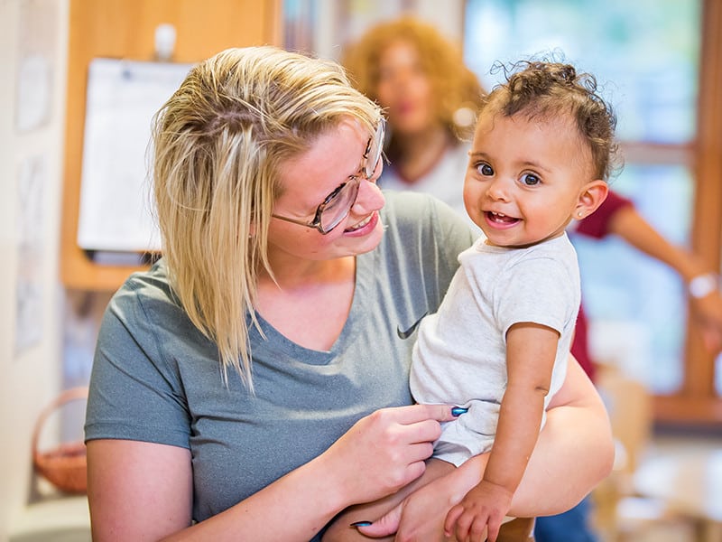 Mother holding child at Educare Seattle