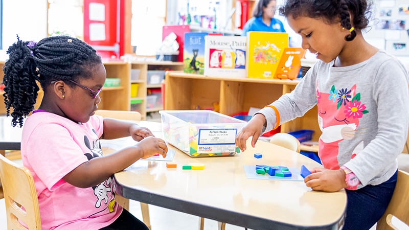 Young children doing activity in classroom