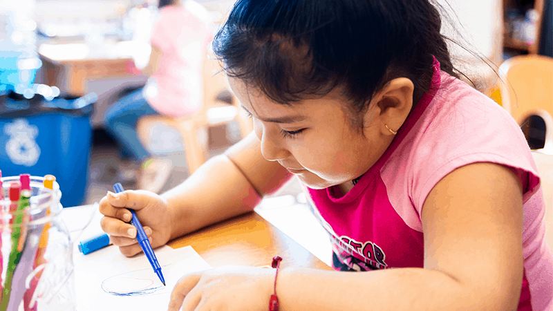 Young girl drawing