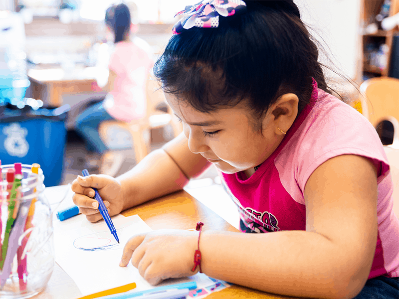 Young girl drawing