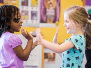 Two girls playing together