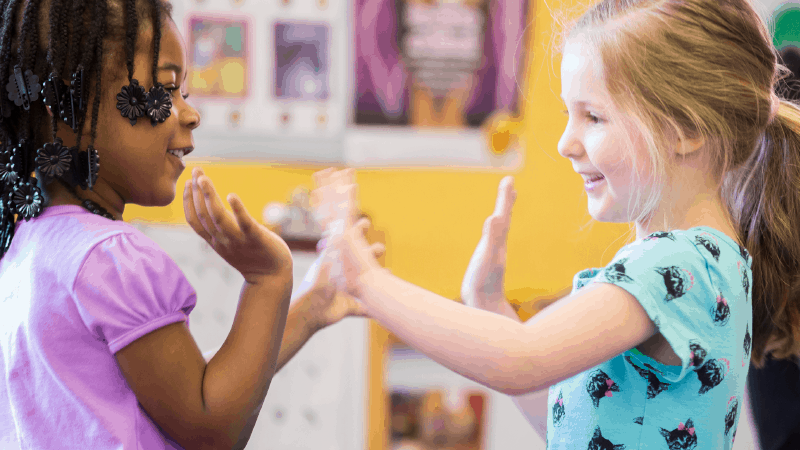 Two girls playing together