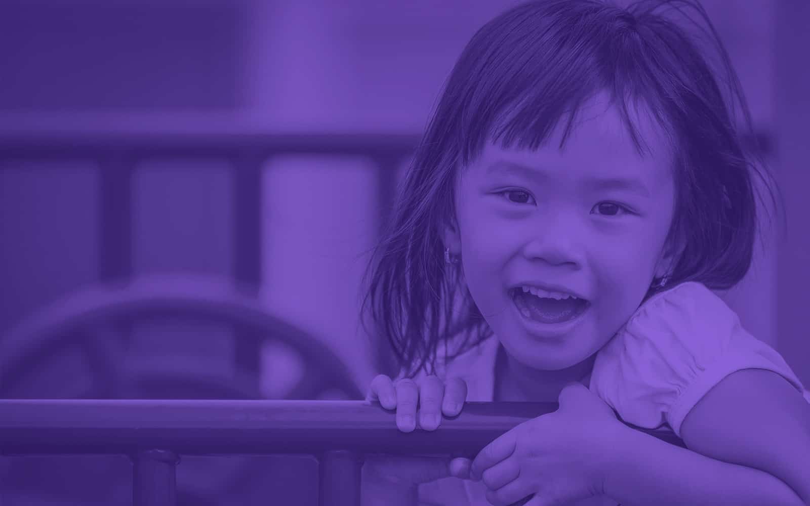 Young child playing on playground