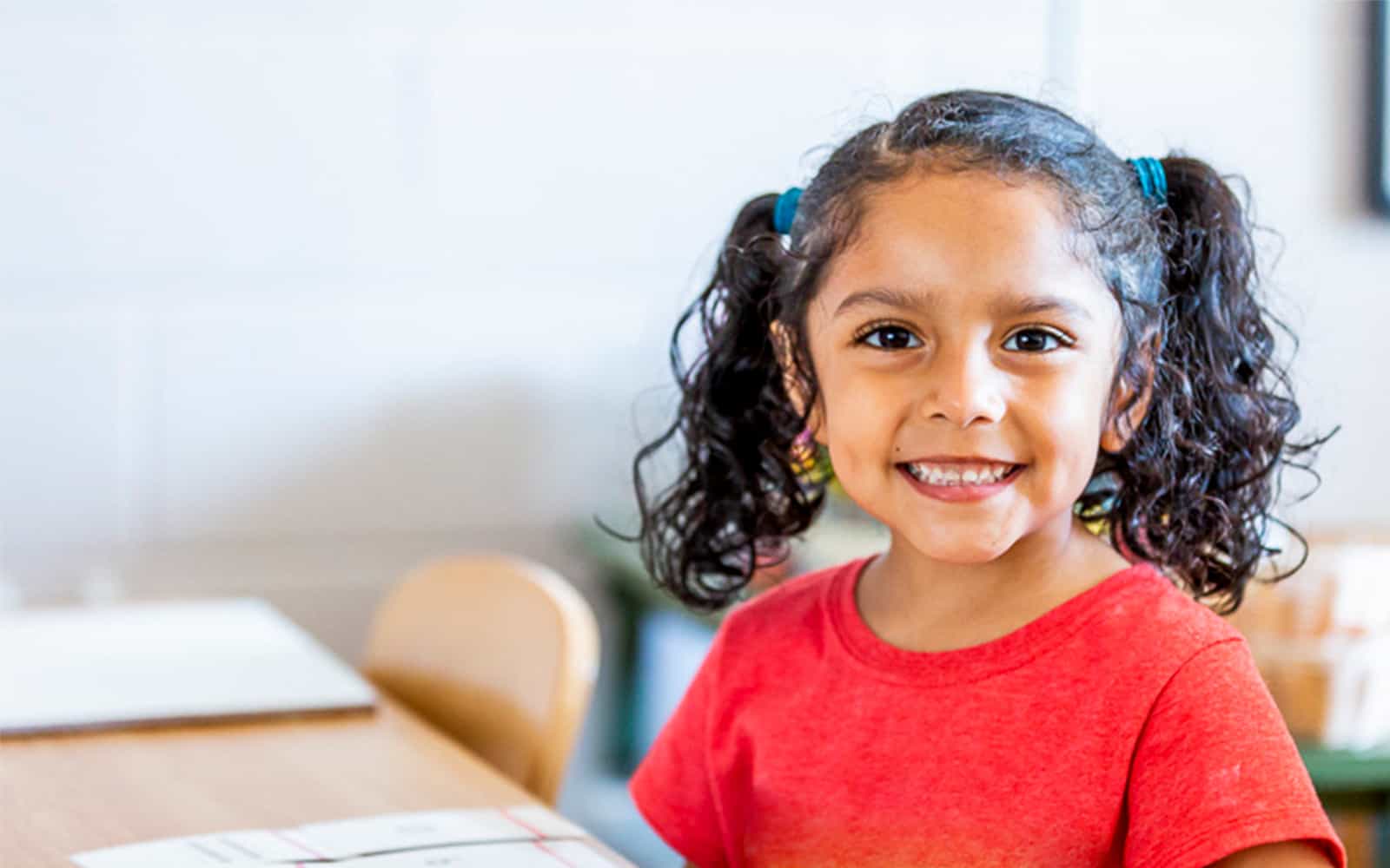 Child sitting at desk