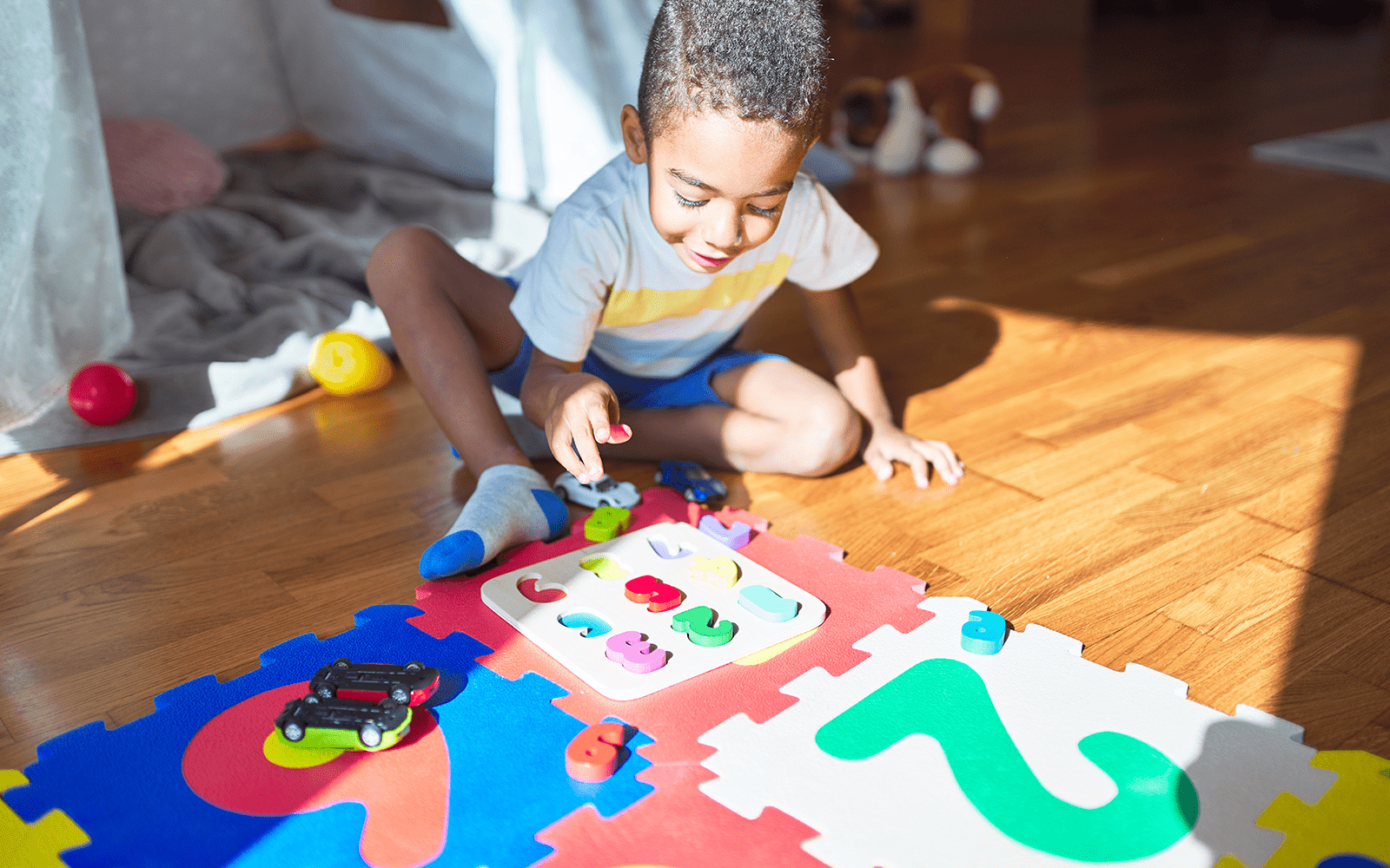 Young boy learning numbers