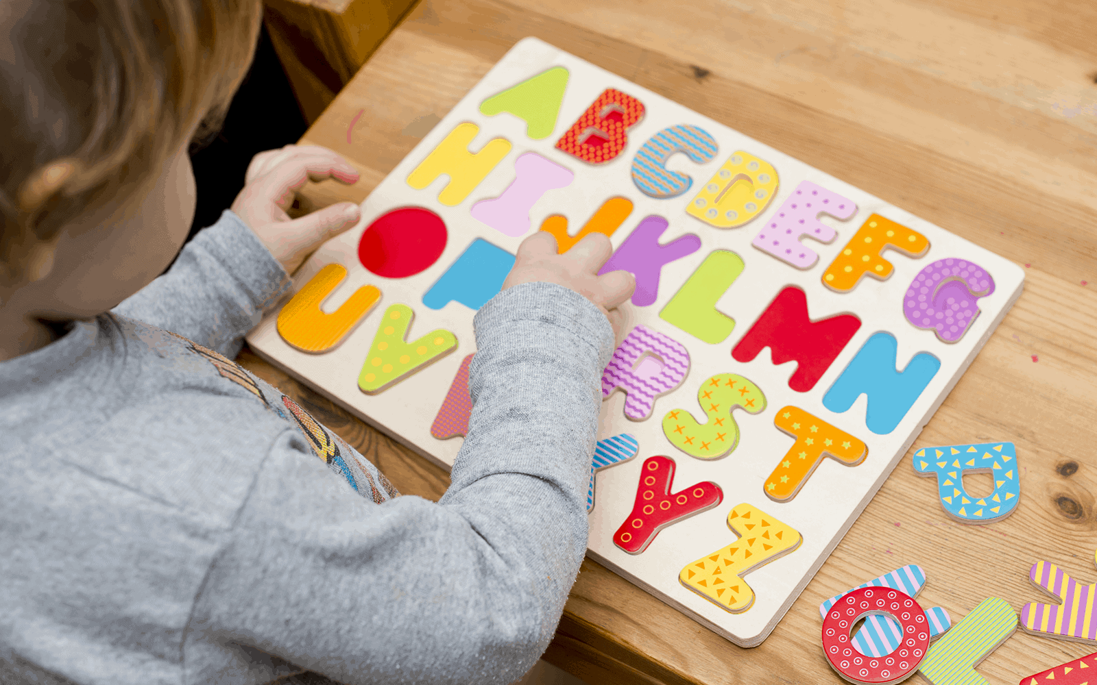 Young child learning the alphabet