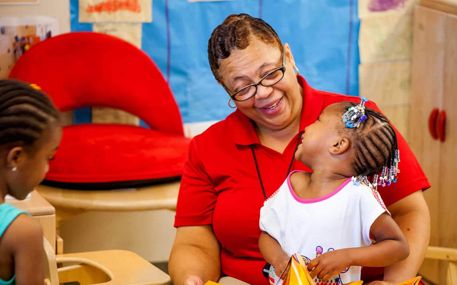 Teacher reading to student