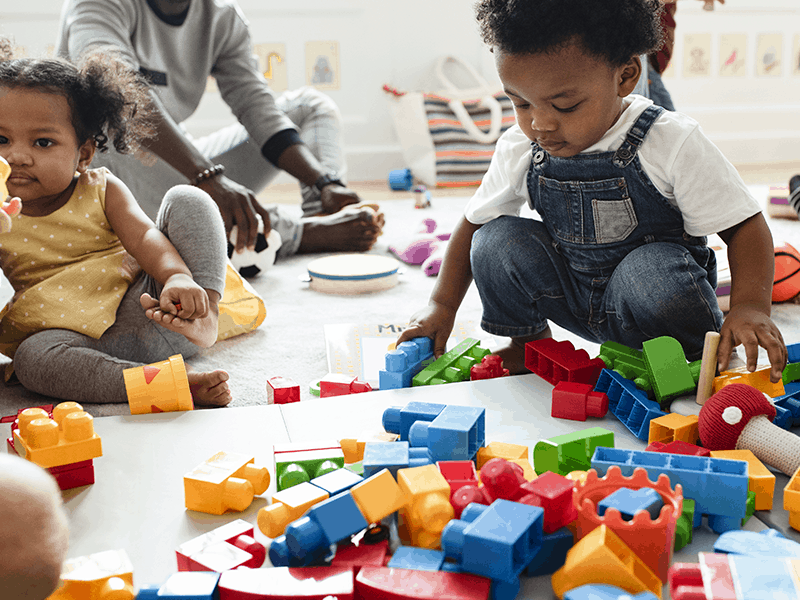 Children playing with block