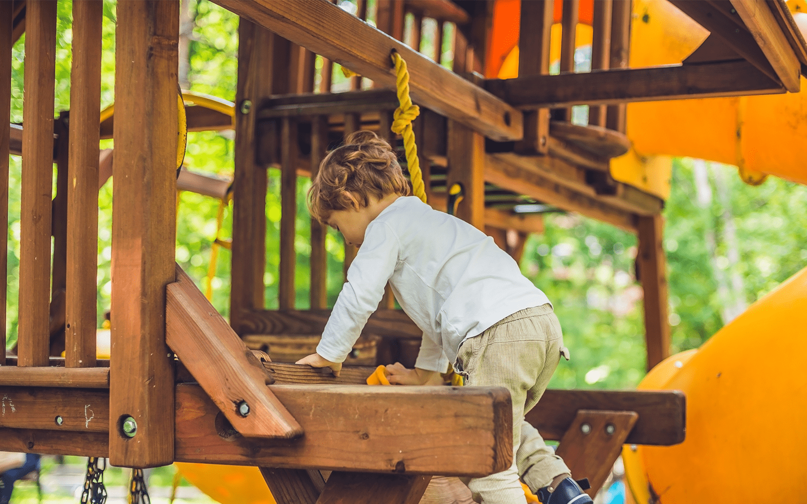 Child Plays on Playground