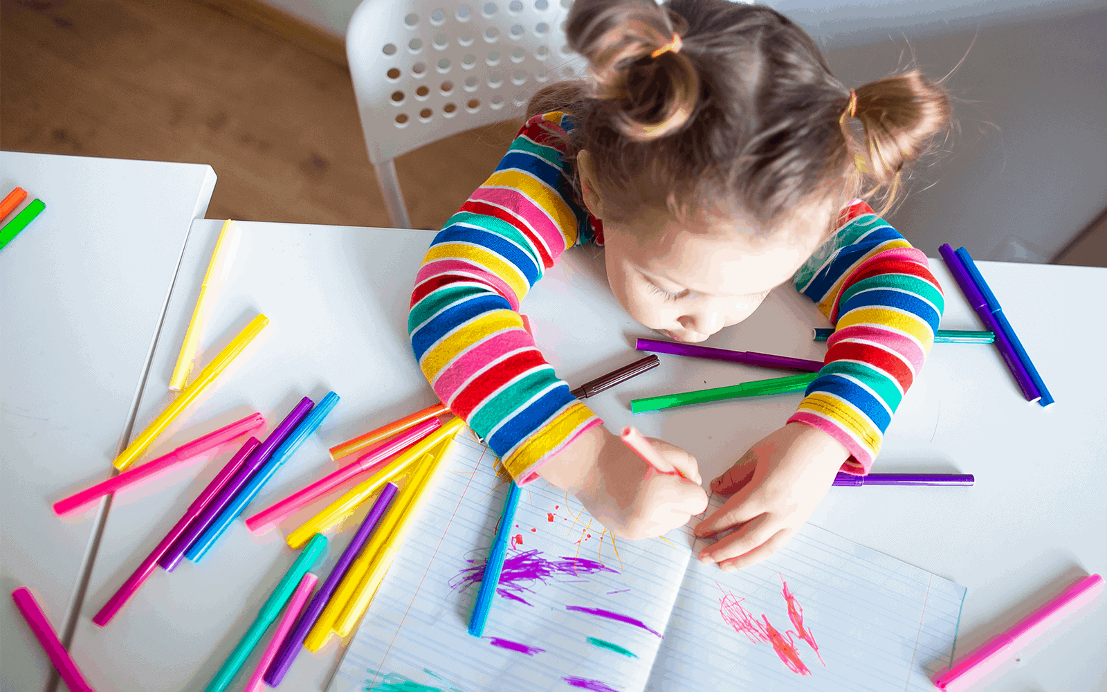 Young child doing an at-home art project