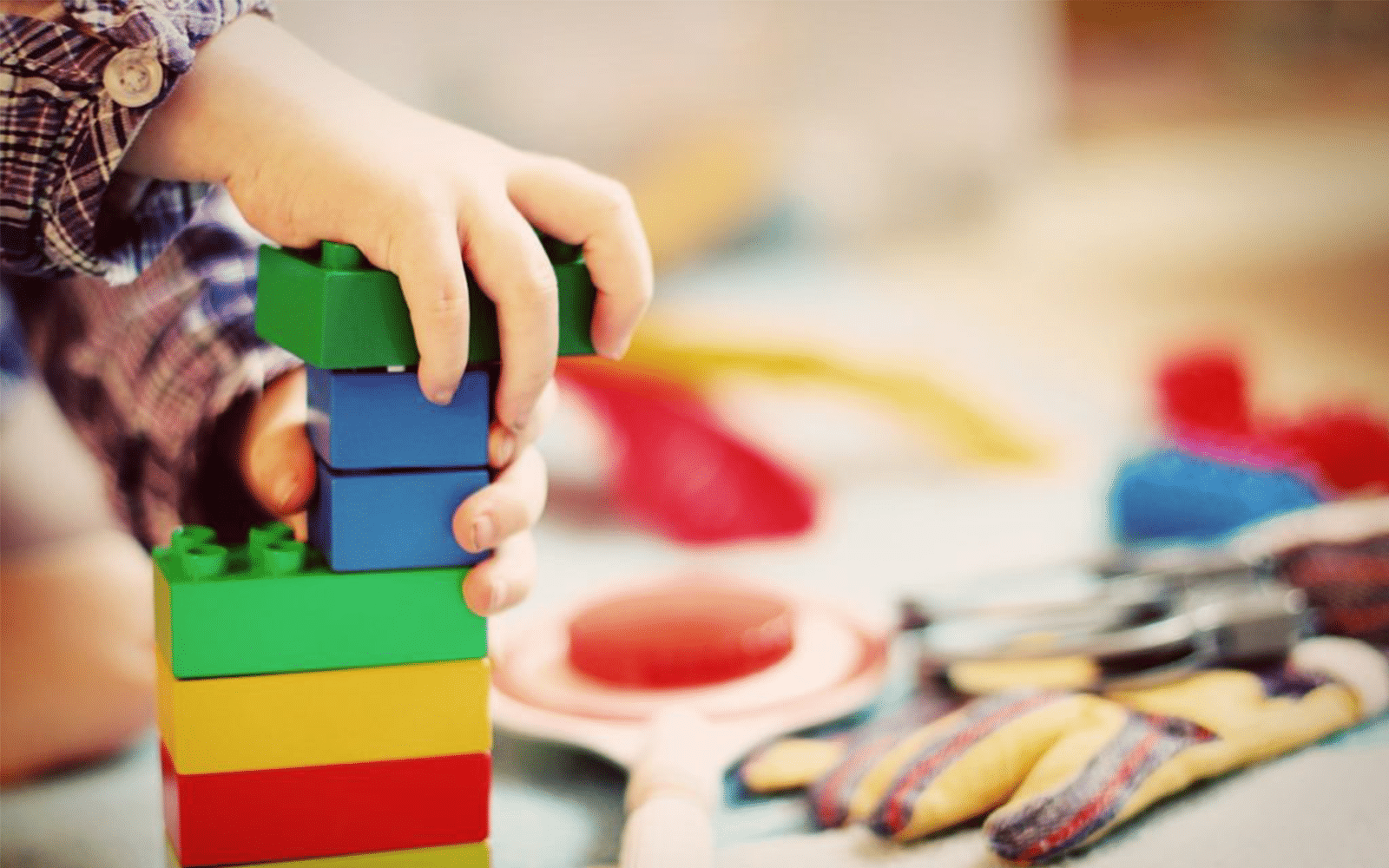 Child playing with legos