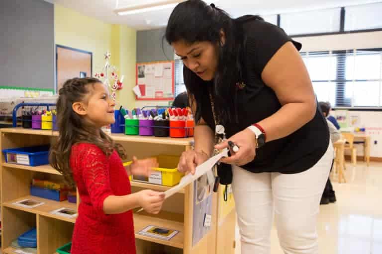 Teacher interacting with student