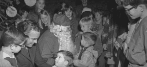 Washington children sit on the laps of Santa and Governor Dan Evans to share their requests in the late 1960s. Picture credit: Thurston Talk