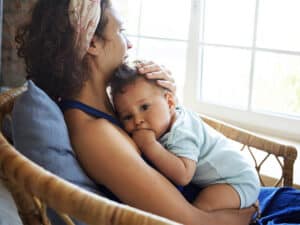 Caregiver holding baby