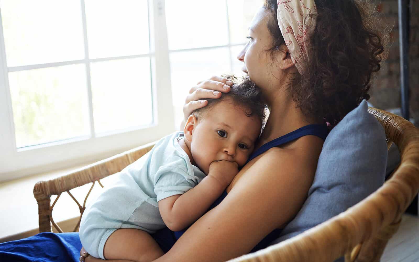 Baby laying on mom's chest