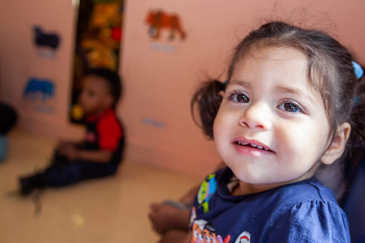 Child smiling in childcare center