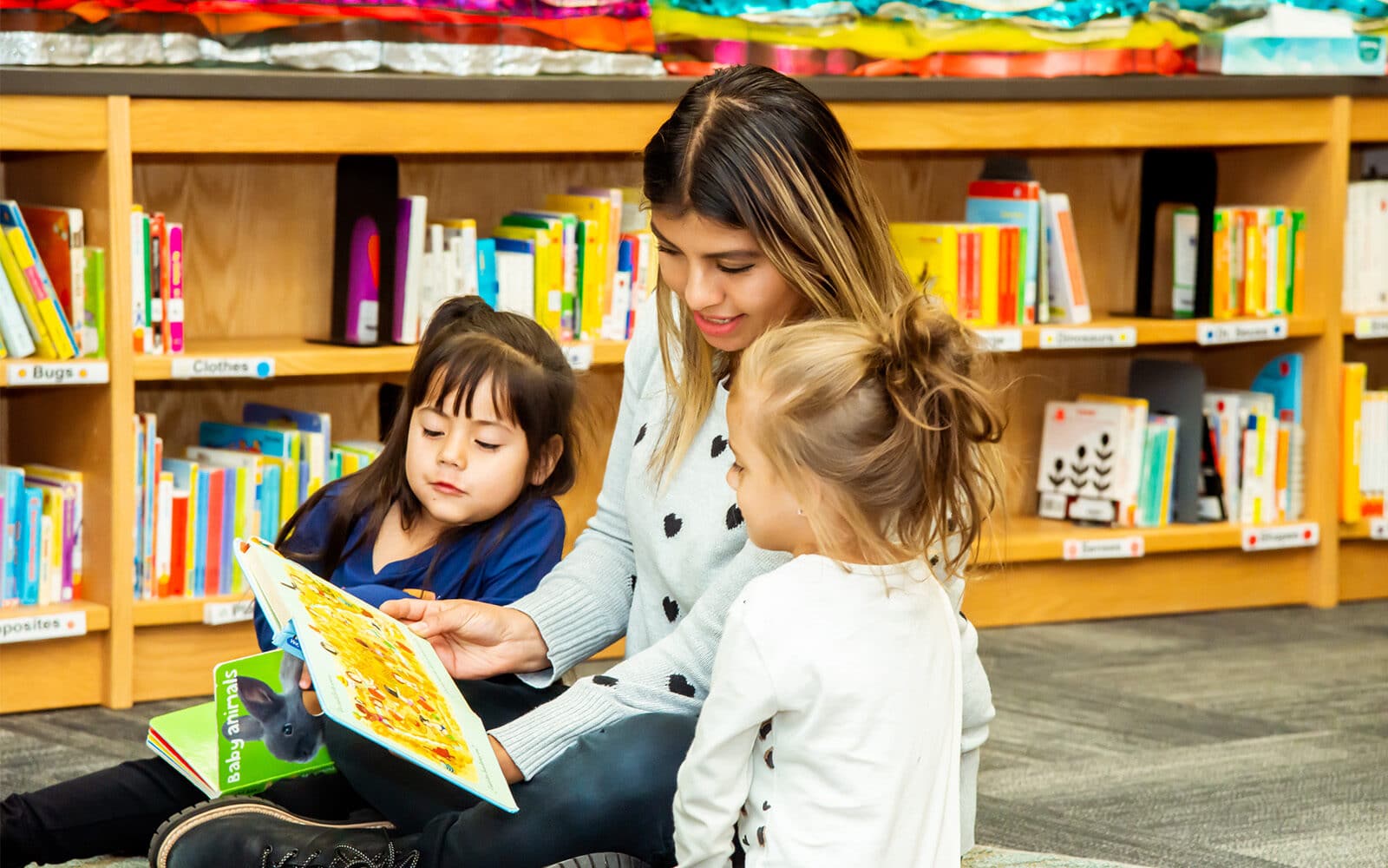 Educare West DuPage teacher reading story to students