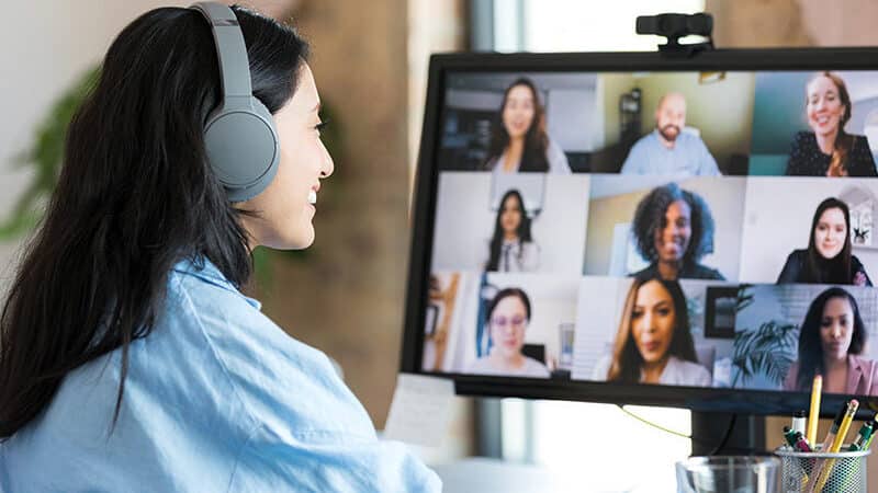 Woman on a virtual call with colleagues