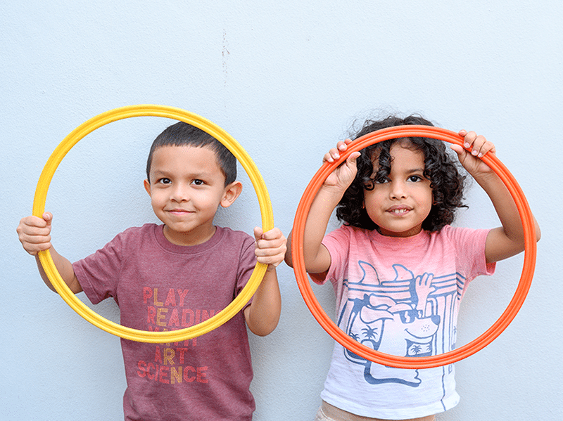 Two boys at Educare Miami with circle toys