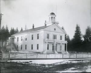 Washington state's original Capitol Building in the snow (1911)