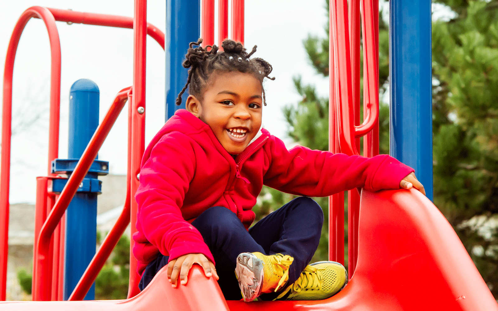 Child plays on slide