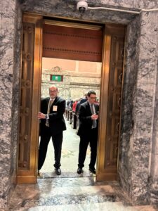 Photo of the Washington State Senate doors being opened ahead of the joint Memorial Service session on 3/19/25.