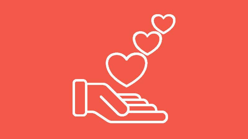 Vector graphic of an open hand with three hearts floating above it_focus areas