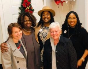 Holly Bamford Hunt & Joanne Bamford of The Bamford Foundation with the Raising Girls team.