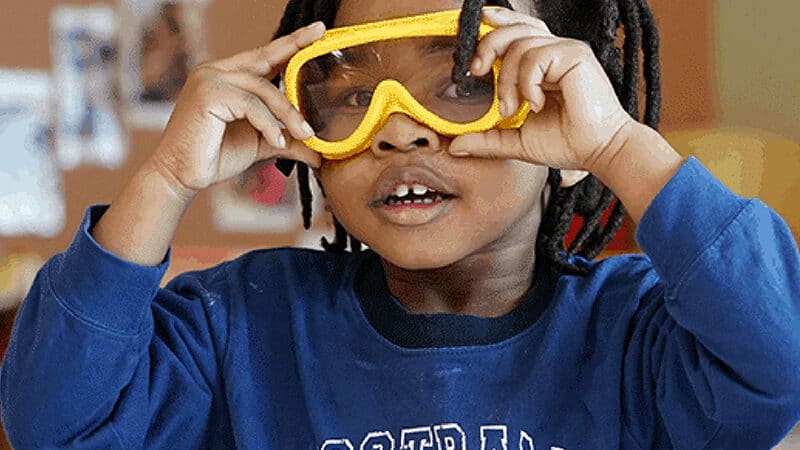 Little boy wearing goggles